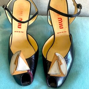 Closet Clearout! Miu Miu peep toe sandal with ankle strap, floral detail 4” heel